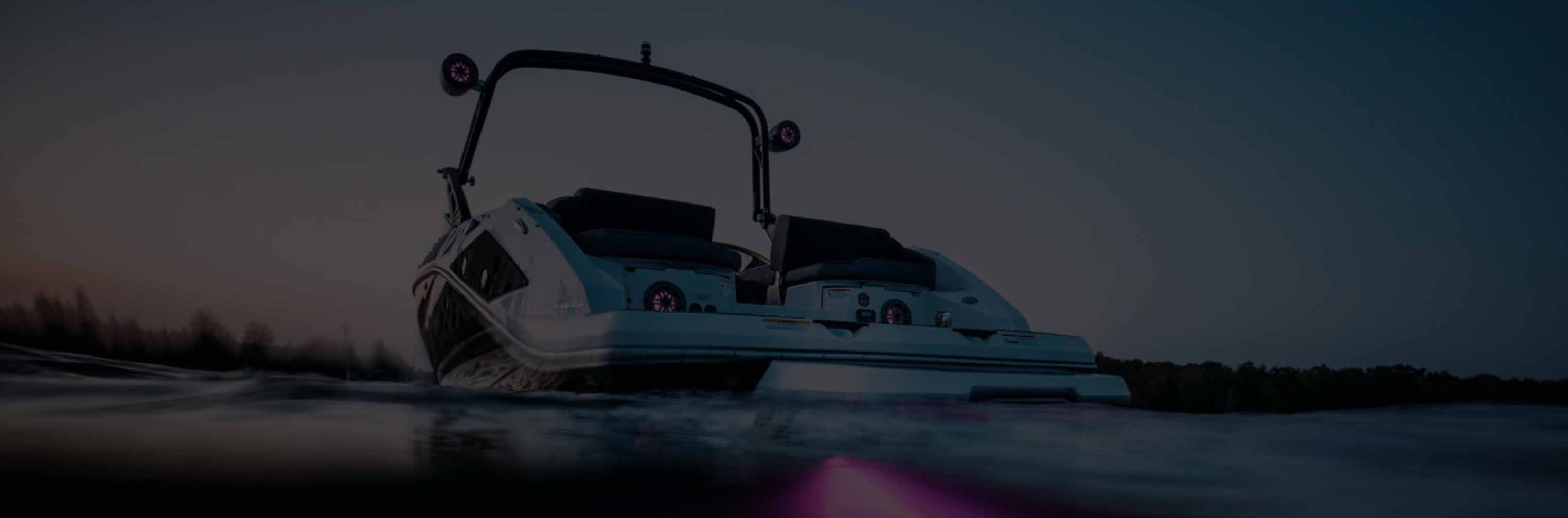 Back end with lit up motor of Scarab boat
