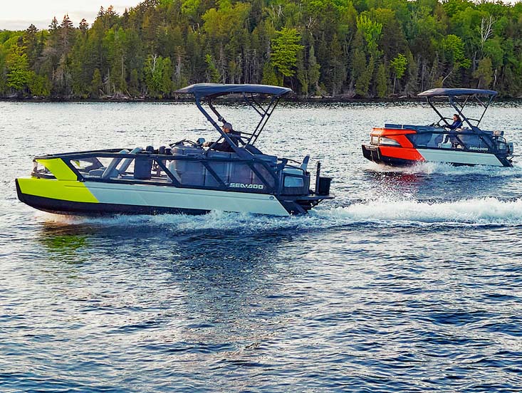Group of Sea-Doo Switch pontoon boats crusing the waterways