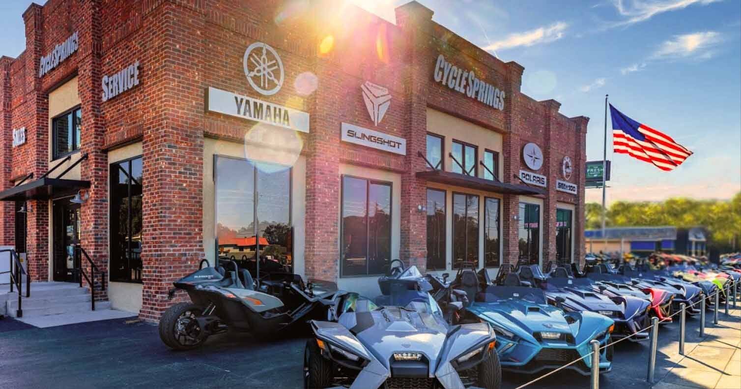 Cycle Springs Powersports Store with newer off-road and on-road models parked outside