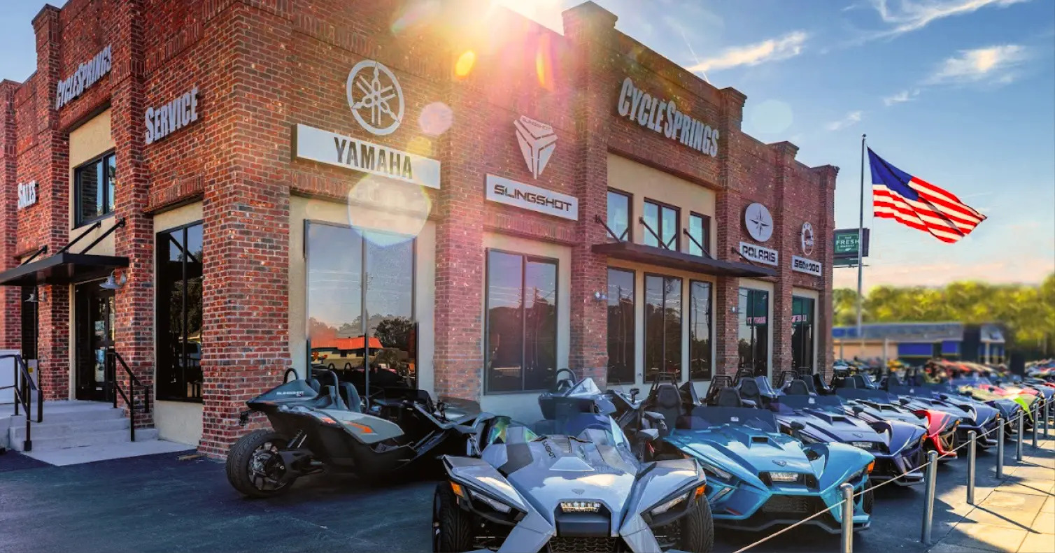 Cycle Springs Store with off-road and on-road models parked outside