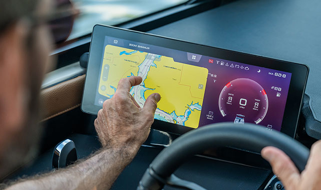Yamaha Connext touchscreen Yamaha Connext touchscreen helm display showing navigation, engine data, and system controls.