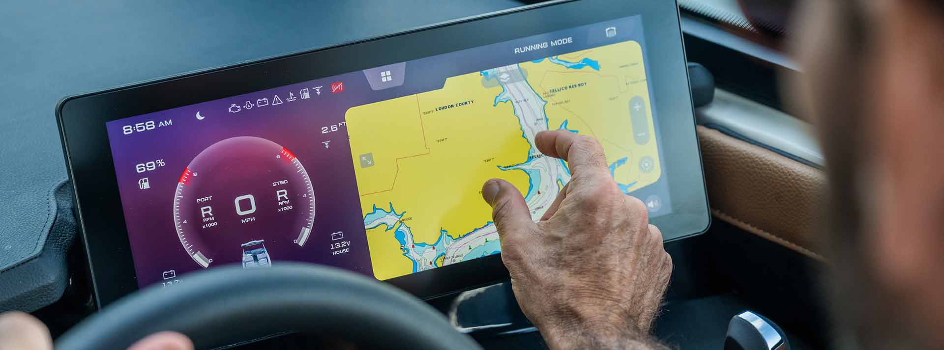 Close-up of the Yamaha 295 Series helm featuring a touchscreen display with GPS navigation and digital boat diagnostics interface