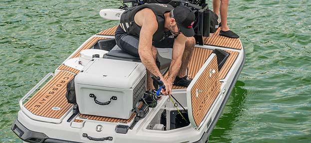 Angled rear view of Yamaha CrossWave with integrated cooler and fishing platform