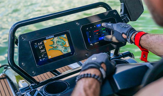 Advanced dual-display Advanced dual-display helm of the Yamaha CrossWave showing navigation and vessel control systems