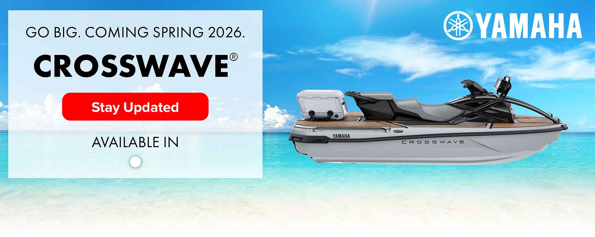 Side profile of the Yamaha CrossWave personal watercraft on a tropical beach with promotional banner reading 'Go Big. Coming Spring 2026.'